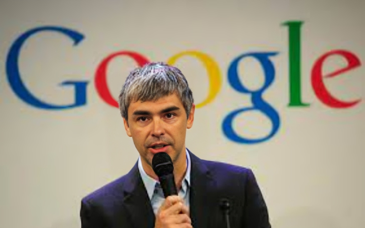 Larry Page speaking in a mike.